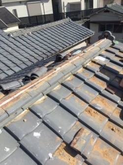 冠瓦仮撤去のし瓦積替え